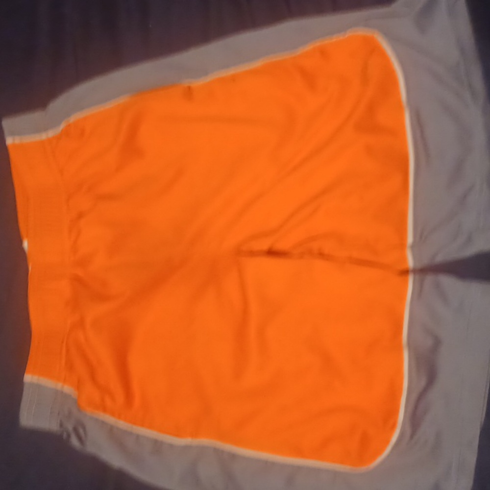 Orange puma shorts